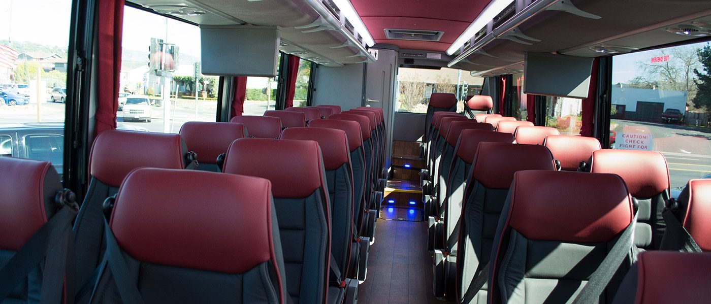 charter-bus-interior-with-red-seats